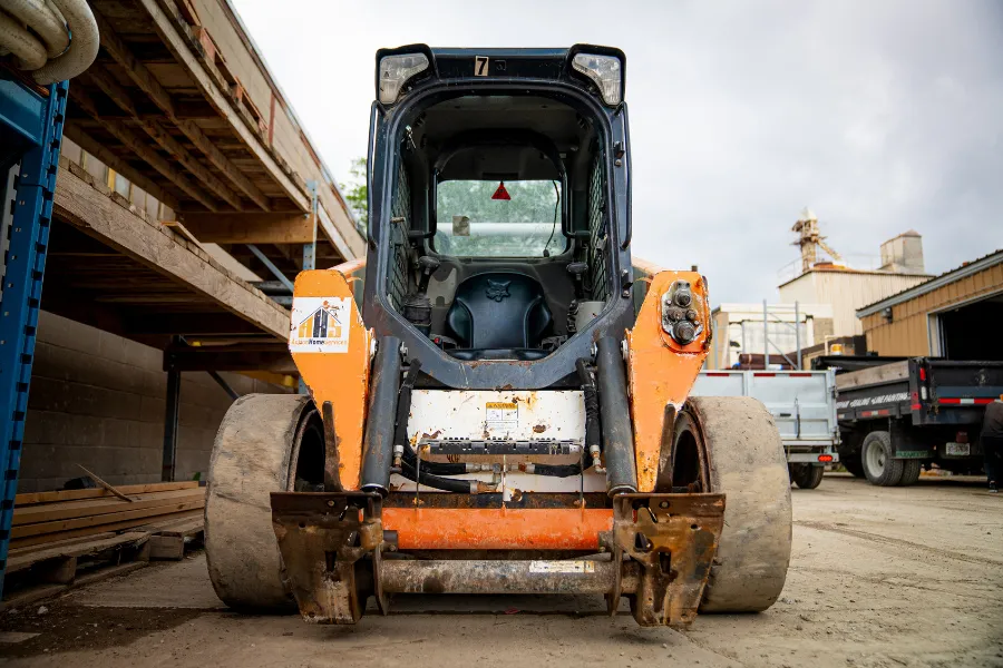 track loaders vs wheel loaders guide toronto