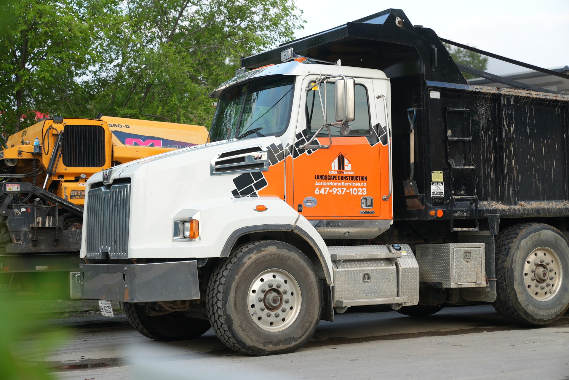 Bins Toronto branded dump truck for concrete and asphalt disposal in the GTA